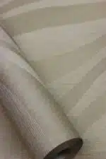 Beige patterned vinyl wallpaper with non-woven backing