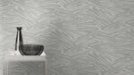 Non-woven vinyl wallpaper in silver with pattern motifs