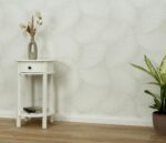 Non-woven vinyl wallpaper in cream with offset pattern