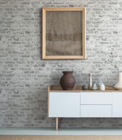 Gray non-woven vinyl wallpaper with offset pattern