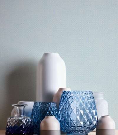 Blue non-woven vinyl wallpaper with subtle pattern