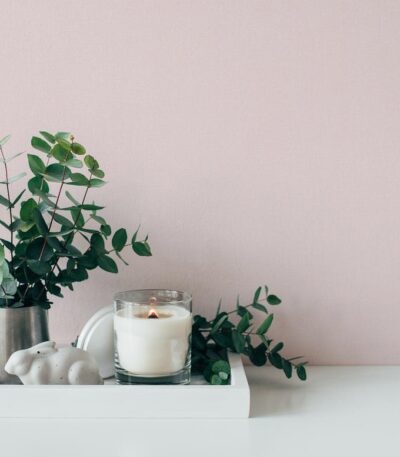 Pink non-woven wallpaper with vinyl surface