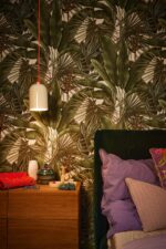 Green non-woven vinyl wallpaper with nature-inspired design