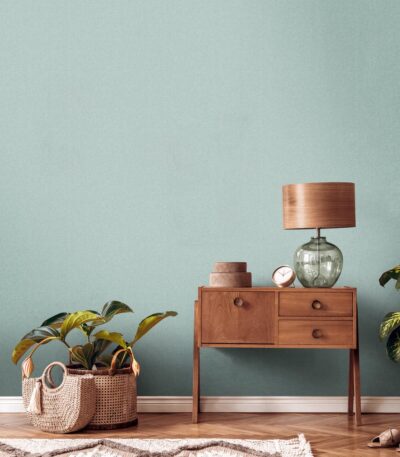 Green non-woven vinyl wallpaper with nature-inspired design