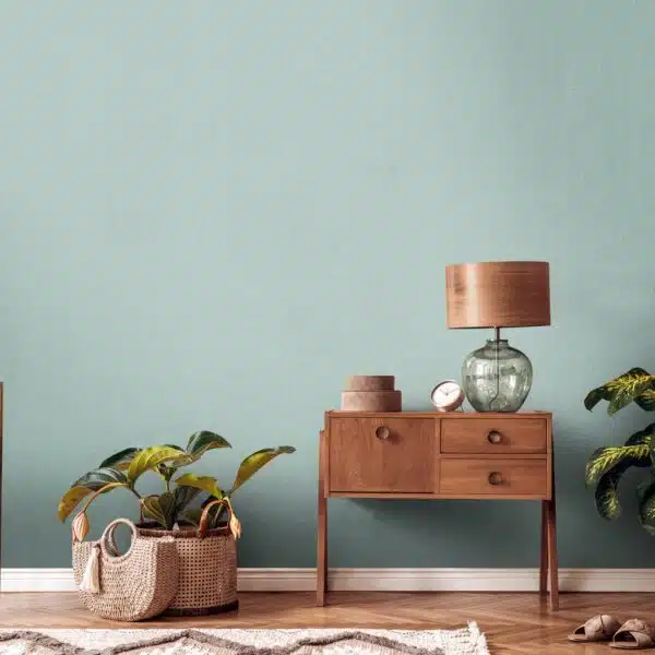 Green non-woven vinyl wallpaper with nature-inspired design