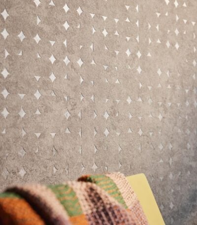 Beige vinyl non-woven wallpaper with subtle pattern